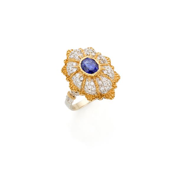 Gold ring with sapphire and diamonds