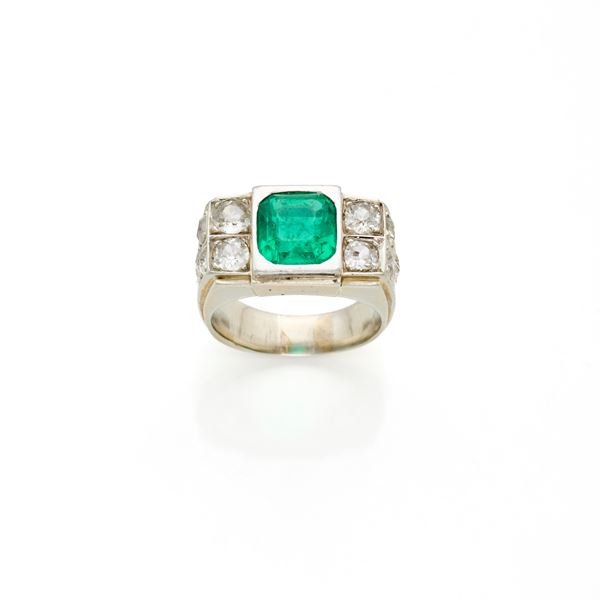 Gold ring with emerald and diamonds