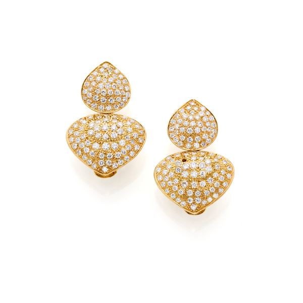 Gold reversible pendant earrings with diamonds