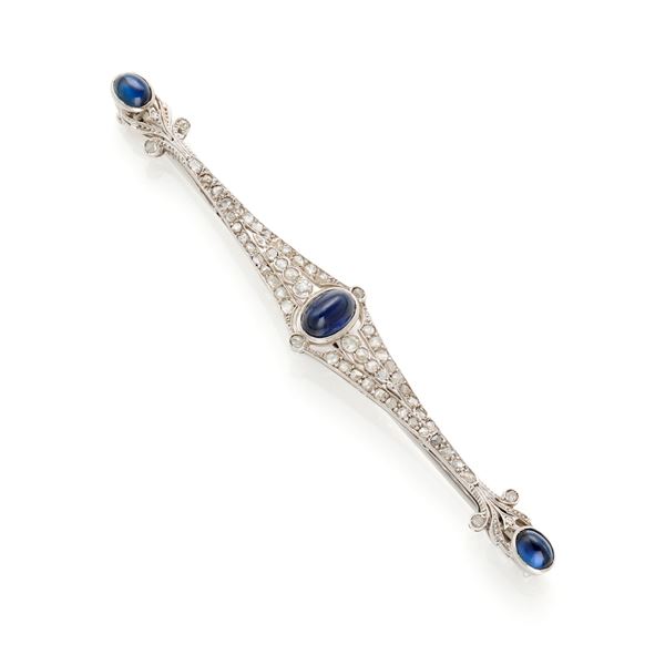 Gold brooch with diamonds and sapphires