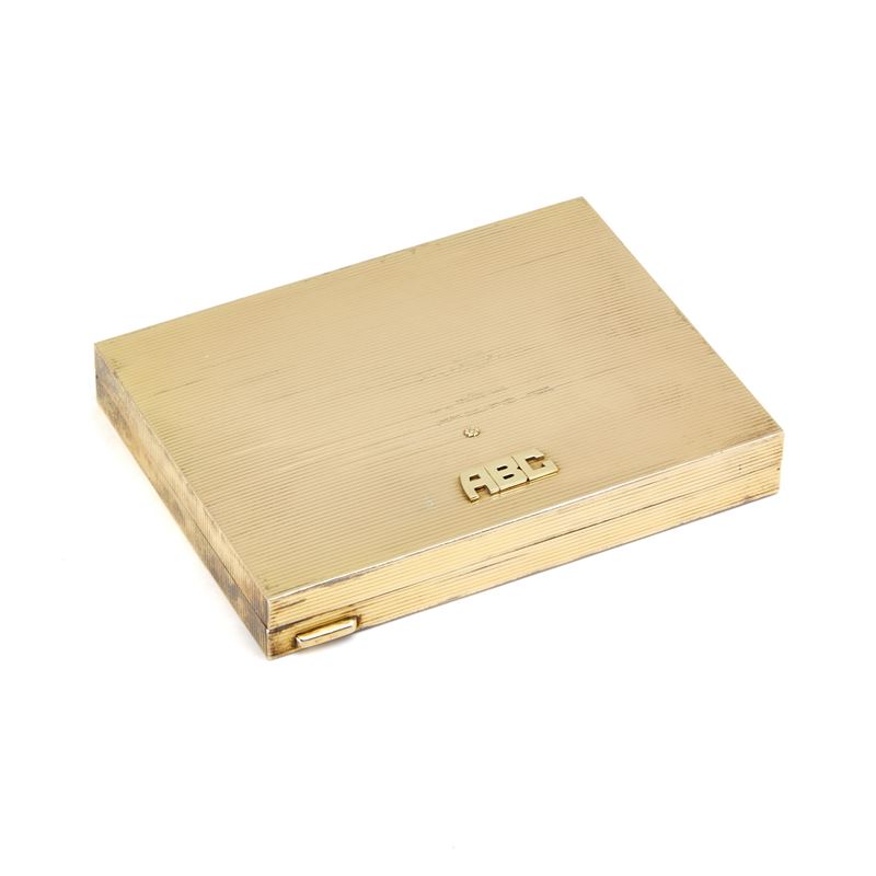 Trousse in argento e oro