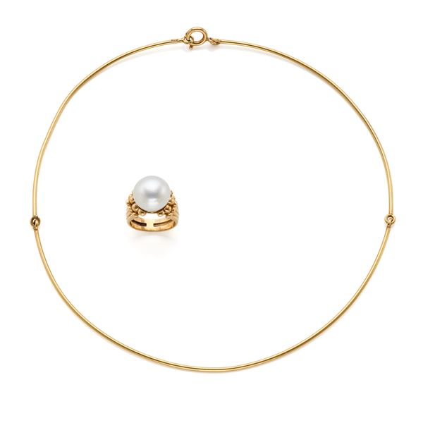 Gold necklace and a ring with pearl