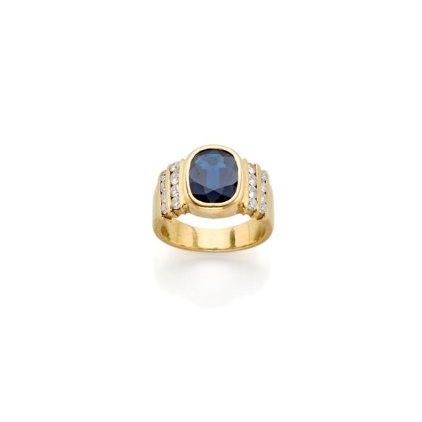 Chiappe gold ring with sapphire and diamonds