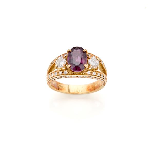 Gold ring with diamonds and ruby