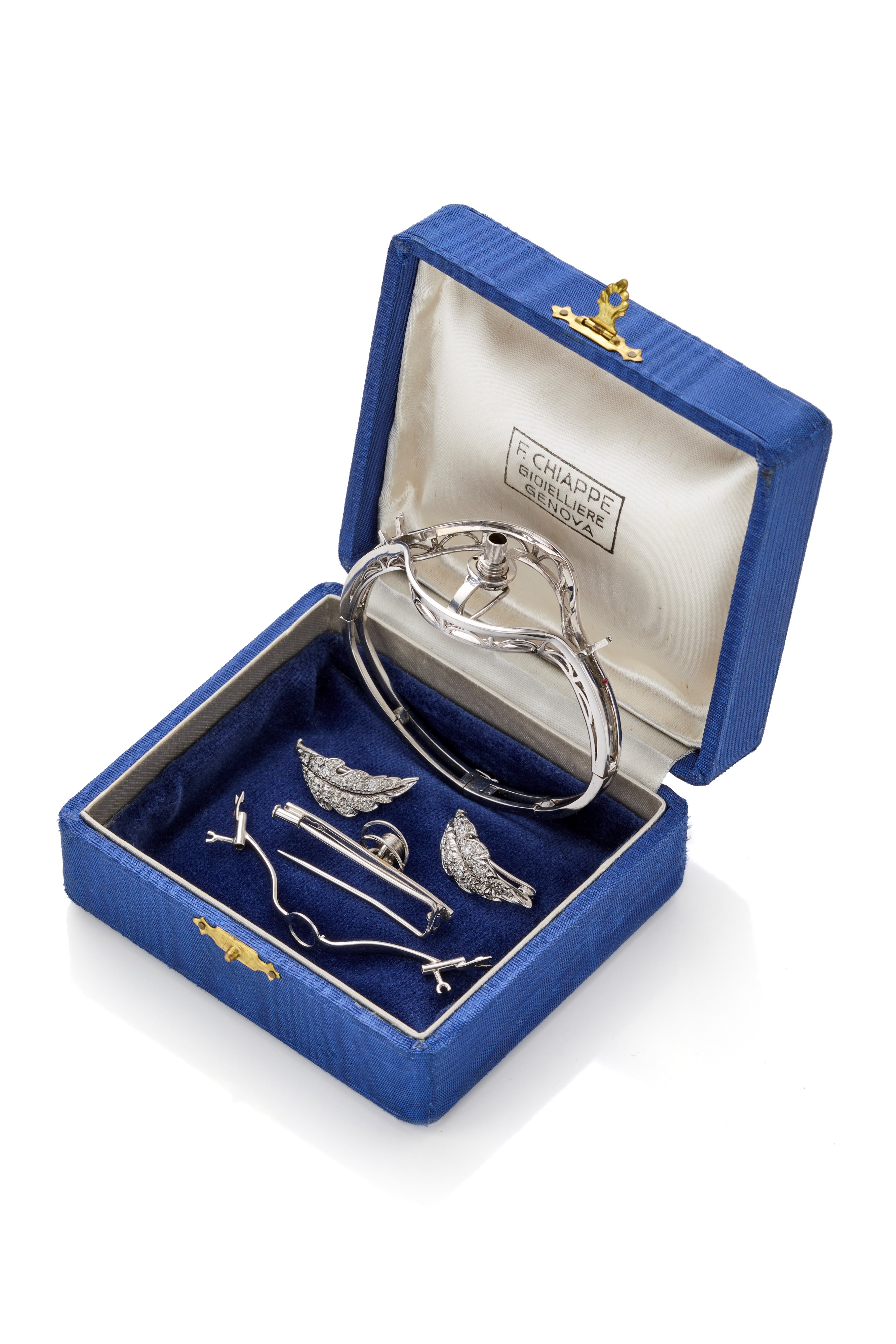 Spilla a fiore trasformabile in oro con diamanti e rubini