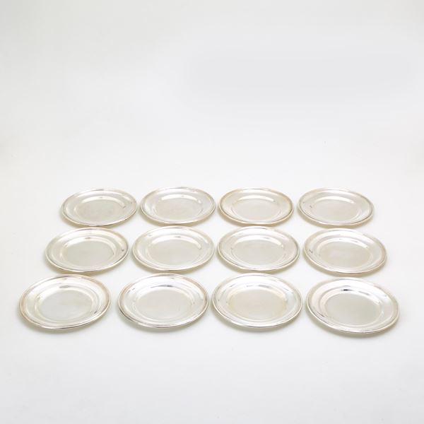 Twelve silver fruit plates 