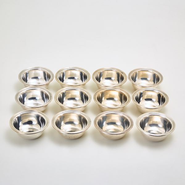 Twelve silver ice cream cups 