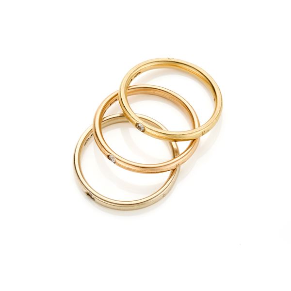 Lot consisting of three Pomellato gold rings