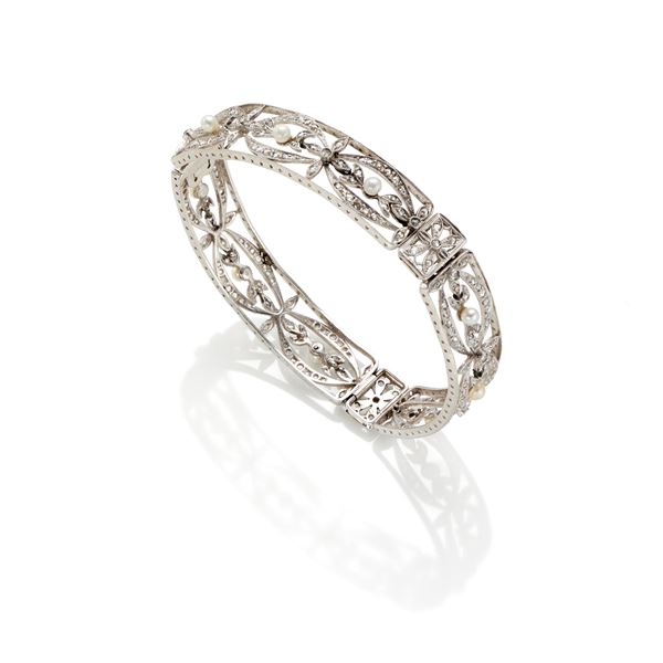 Bracciale in platino con diamanti e perle