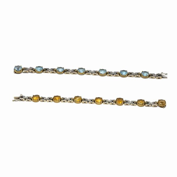 Lotto composto da due bracciali (trasformabili in collana) con pietre preziose