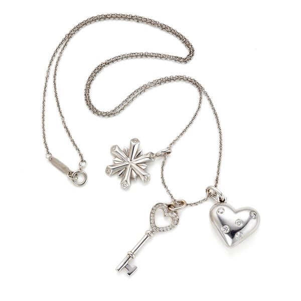 Tiffany - Catenina con tre charms Tiffany & co in oro 