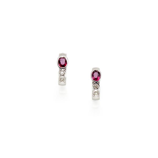 Gold earrings with diamonds and rubies