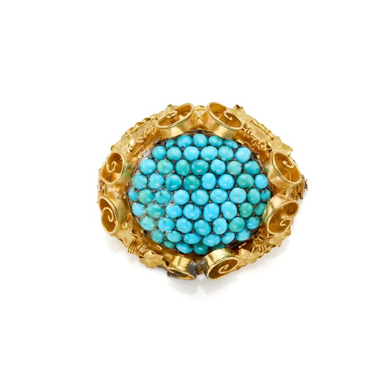Spilla in oro con turchesi