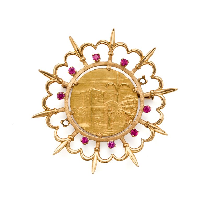 Spilla in oro con rubini sintetici