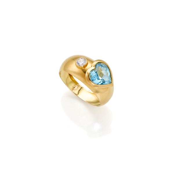 Anello in oro con topazio