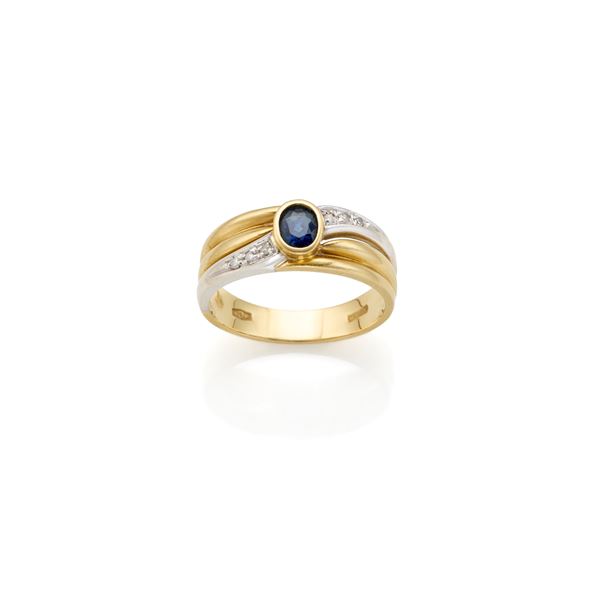 Anello in oro con zaffiro e diamanti