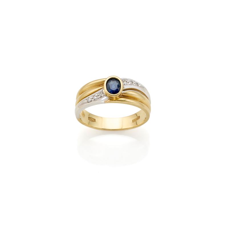 Anello in oro con zaffiro e diamanti