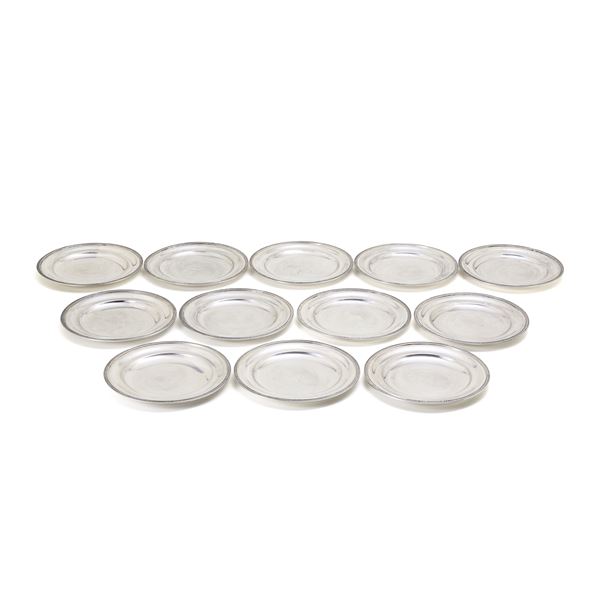 Twelve silver fruit plates