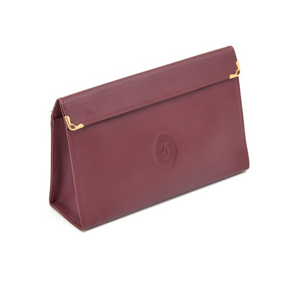 Clutch Les Must de Cartier  - Asta GIOIELLI, OROLOGI E LUXURY GOODS - Faraone Casa d'Aste