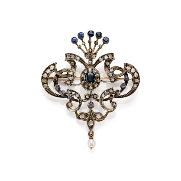 Silver and gold brooch with diamonds and sapphires