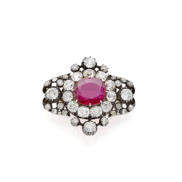 Gold and silver brooch with diamonds and ruby