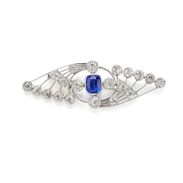 Platinum brooch with diamonds and sapphire