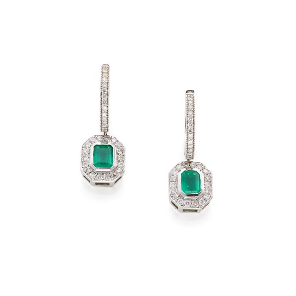 Gold earrings with diamonds and emeralds