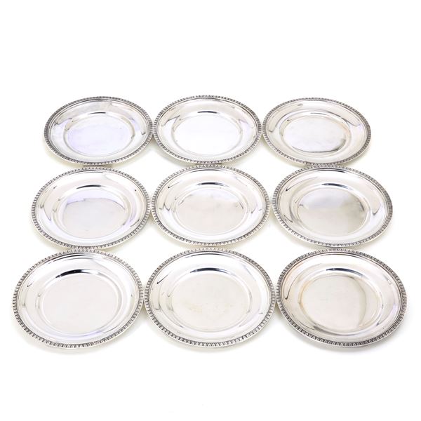 Nine silver fruit plates