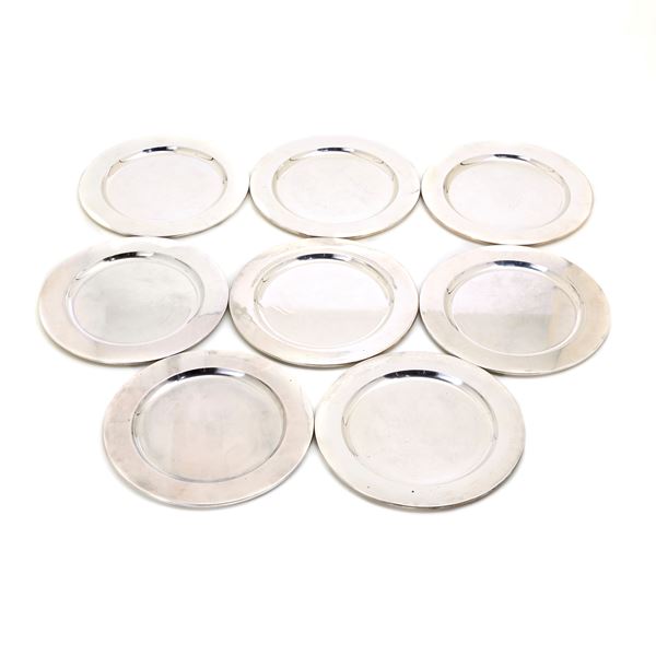 Eight silver underplates