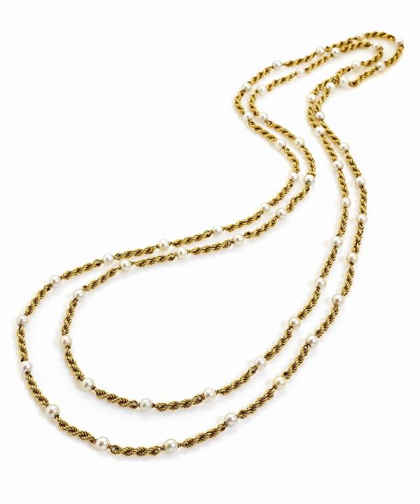 Collana lunga in oro giallo  - Auction Gioielli e Orologi del XX Secolo - Faraone Casa d'Aste