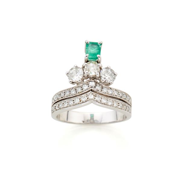 Gold ring with diamonds and emerald