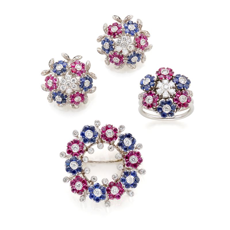 Demi parure in oro bianco 18 Kt con diamanti, rubini e zaffiri