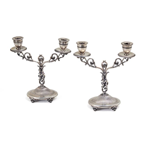 Pair of silver candelabras