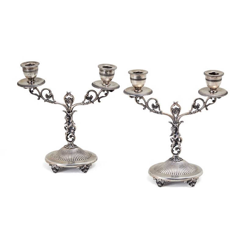 Due candelabri in argento