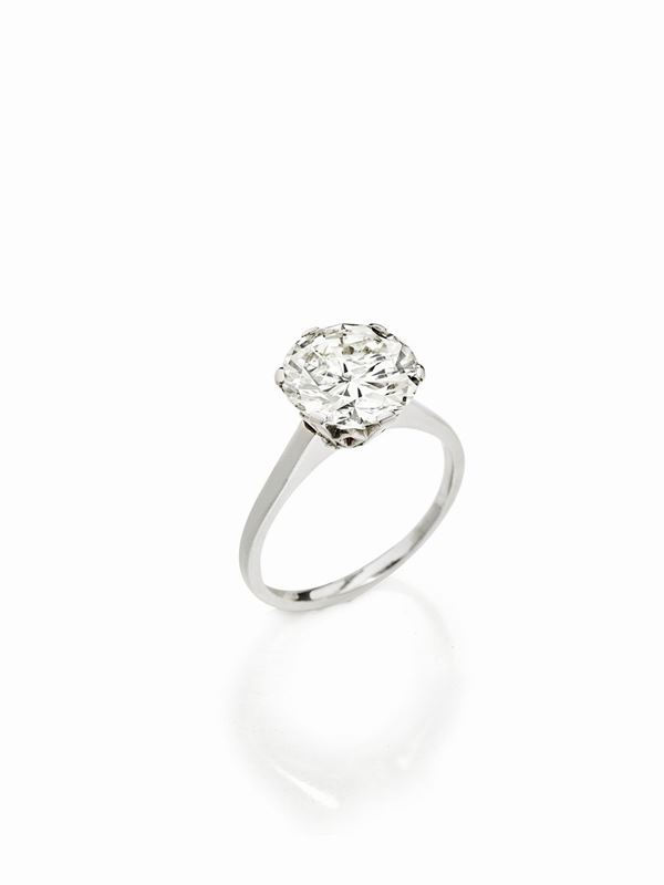 Solitario in oro bianco con diamante di circa 6,55 ct