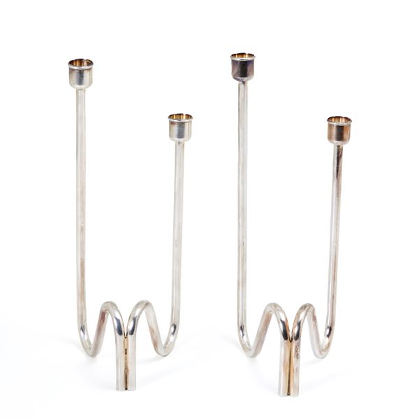 Pair of silver-plated metal candlesticks signed Sabattini