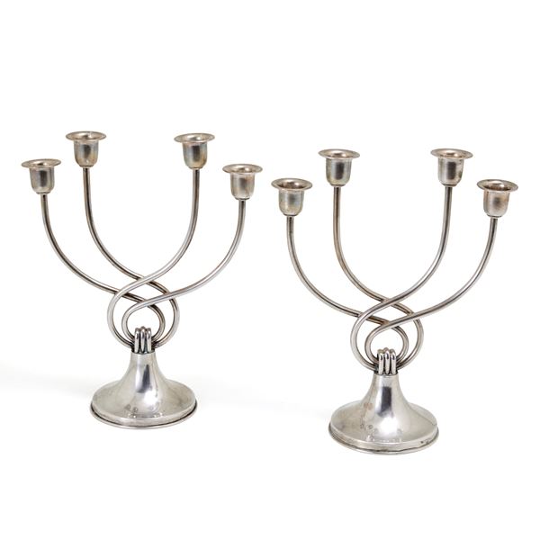Two silver candelabra