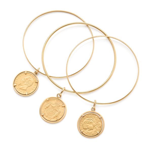 Three bracelets with gold coins