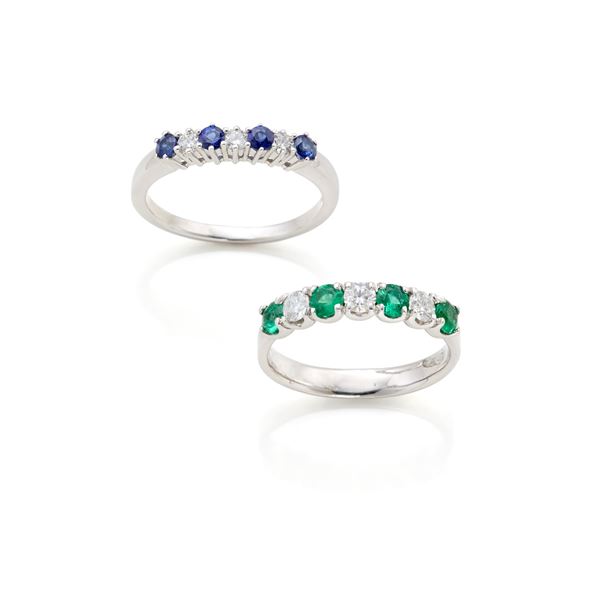Two gold rings with diamonds, emeralds and sapphires