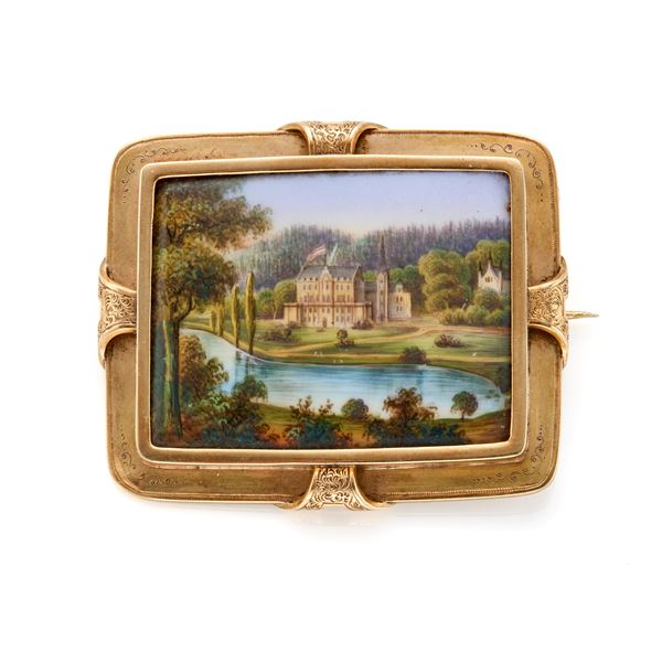 Gold brooch with miniature