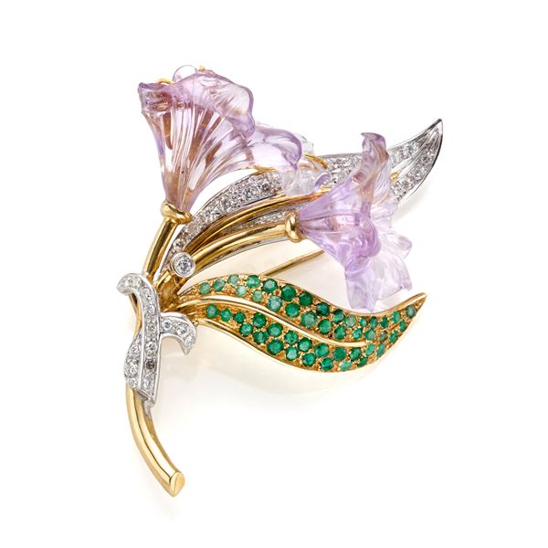 Gold brooch with diamonds and emeralds