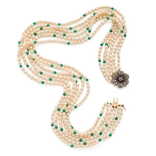 Pearl necklace with gold and silver clasp