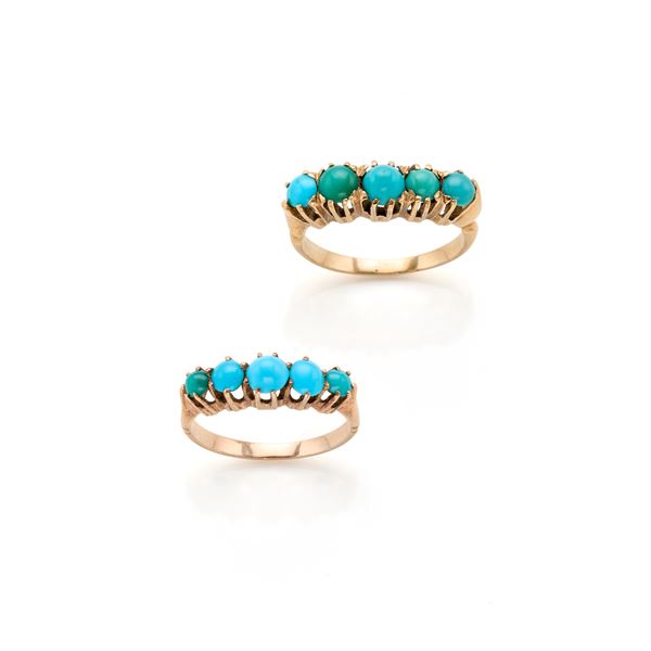 Due anelli in oro con turchesi