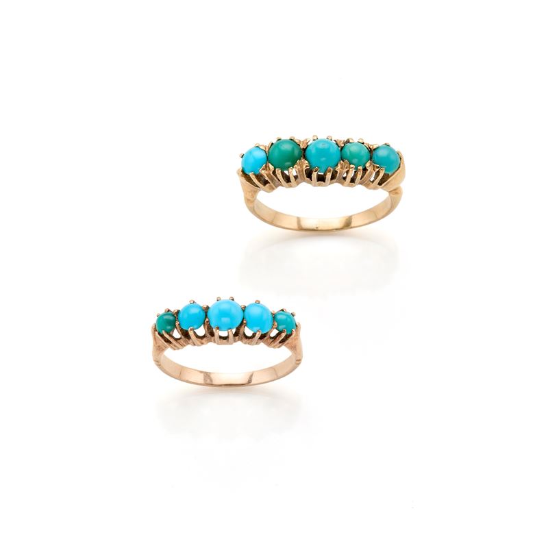 Due anelli in oro con turchesi