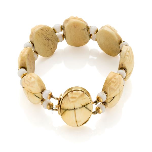 Bracelet with gold clasp