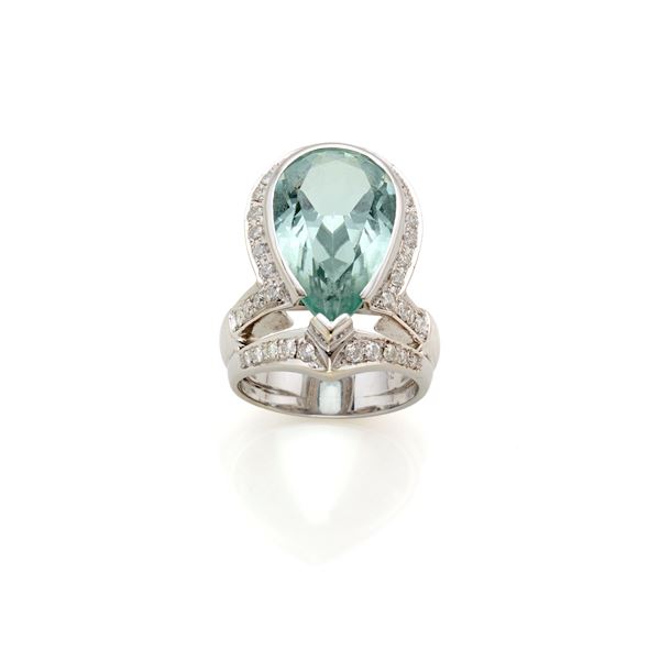 Gold ring with diamonds and aquamarine