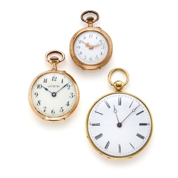 Three gold pocket watches