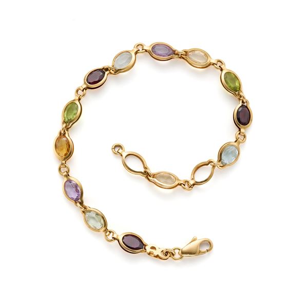 Gold bracelet with gems
