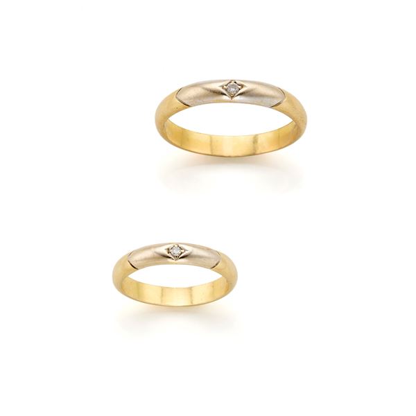 Two gold rings with diamonds