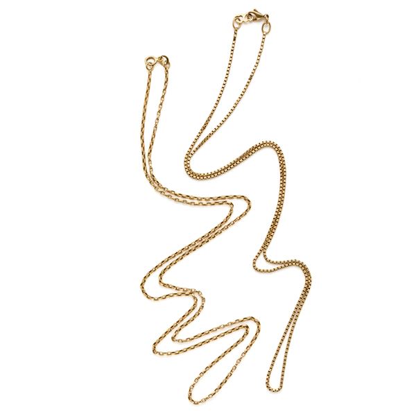 Two gold chain necklaces
